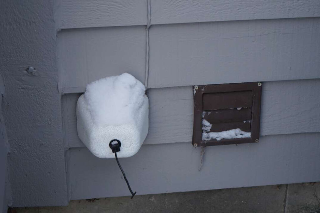 Installing Faucet Covers for Winter 1024x683 1